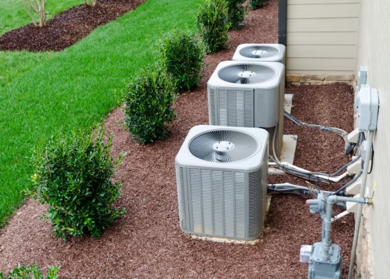 hvac system beside a house